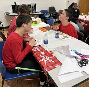 NFB BELLX Academy students in Salisbury attend a holiday party.