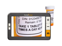 Photograph of a Handheld electronic magnifier enlarging text on a prescription label. Screen displays “DIN: 0123456789” and “TAKE 1 TABLET ... TIMES A DAY”