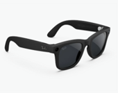 Product photograph showing assistive or smart glasses that help users access visual information. Side angle highlights curved arms, nose bridge, and glossy finish against a plain white background.